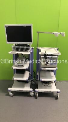 2 x Olympus Stack Trolleys With Olympus OEV261H LCD Monitor, Olympus EVIS Lucera CV-260SL Digital Processor, Olympus EVIS Lucera CLV-260SL Processor/Light Source Unit, Olympus MAJ-1154 Pigtail Connector, Olympus Keyboard, Sony Color Video Printer UP-21MD 