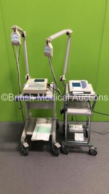 1 x Nihon Kohden Cardiofax Gem ECG Machine on Stand and 1 x Nihon Kohden Cardiofax Q ECG Machine on Stand with Leads (Both Power Up)