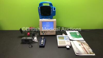 Mixed Lot Including 1 x Fukuda Denshi Dynascope DS-7100 Patient Monitor Including ECG/ Resp, Sp02, TEMP, NIBP and Printer Options (Powers Up with Frozen Display Screen-See Photo) 1 x GE Dinamap Procare 400 Patient Monitor (No Power) 1 x GCX 707.773.1100 M