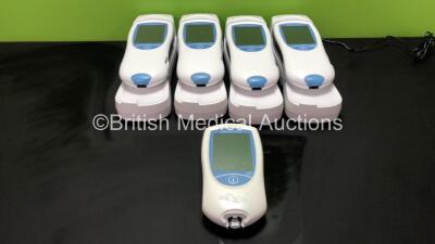 4 x Roche Coaguchek XS Pro Plus Blood Coagulation Monitors and 1 x Roche Chek XS Pro Meter with 4 x Base Units and 1 x AC Power Supply (All Power Up)