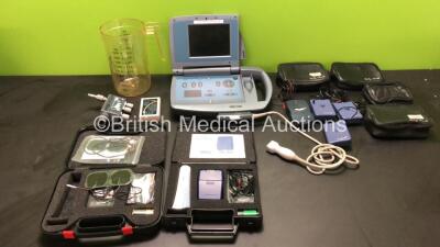 Mixed Lot Including 1 x Agilent Technologies M2430A Ultrasound System with 1 x Transducer / Probe (Untested Due to No Battery) 1 x Respironics Whisperflow, 1 x Cup, 1 x apm XP 2000 Unit (Untested Due to Possible Flat Battery) 6 x Tens Machines