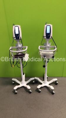 2 x Welch Allyn Spot Vital Signs Monitors on Stands with Assorted Leads (Both Power Up)