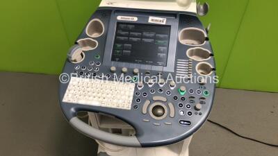 GE Voluson E8 Flat Screen Ultrasound Scanner *S/N D163891* **Mfd 05/2012** Software Version 12.0.6.586 with 1 x Transducer / Probe (C4-8-D Ref 5336340 *Mfd 02/2012*) with Mitsubishi P95 Printer (Powers Up) - 6