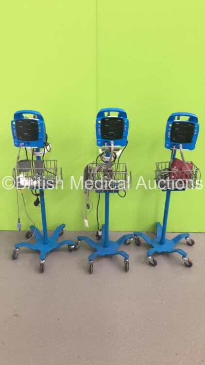 3 x GE Dinamap ProCare Patient Monitors on Stands with 3 x SpO2 Finger Sensors,2 x BP Hoses and 2 x BP Cuffs (All No Power)