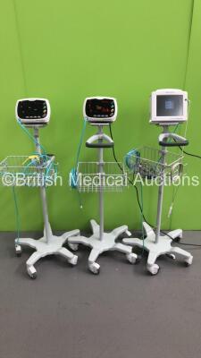 2 x Huntleigh SmartSigns Lite Plus Patient Monitors on Stands with 2 x BP Hoses and 1 x Huntleigh SmartSigns Compact 750 Patient Monitor on Stand with 1 x BP Hose and 1 x SpO2 Finger Sensor (All Power Up) * Asset No FS0155385 / FS 0022918 / FS0173177 *