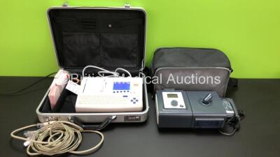 Mixed Lot Including 1 x Seca CT8000i ECG Machine with Lead and Accessories in Case and 1 x Philips Respironics REMstar Auto A-Flex System One CPAP Unit with Humidifier and Power Supply in Carry Case (Both Power Up) *41529 / P04428691 / H02948695*