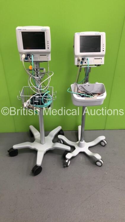 2 x Fukuda Denshi DS-7100 Patient Monitors on Stands with Assorted Leads (Both Power Up) *SN 50001979 / 50001980*