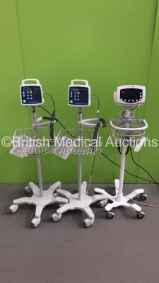 2 x CSI Criticare 506N3 Series Vital Signs Monitors on Stand with 2 x BP Hoses and 1 x Welch Allyn 53N00 Vital Signs Monitor on Stand with SPO2 Finger Sensor and BP Hose (All Power Up) *S/N FS0096573 / FS0096578 / FSFS0096575*