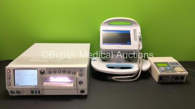 Mixed Lot Including 1 x GE Masimo Set 250cx Series Fetal Monitoring System Including ECG, SpO2, NIBP, UA, US and US2 Options (Powers Up with Damaged Casing-See Photo) 1 x Welch Allyn 6000 Series Vital Signs Monitor with Mounting Table (Powers Up) 1 x EMS 