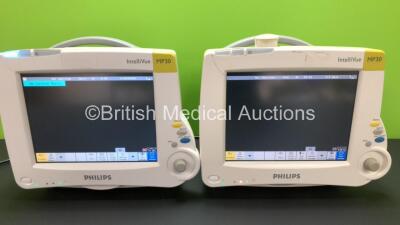 2 x Philips Intellivue MP30 Touch Screen Patient Monitors Version F.01.43 / G.01.80 (Both Power Up with Some Casing Damage - See Photos) *Mfd 2005 / 2006 **S/N DE64019641 / DE52613316**