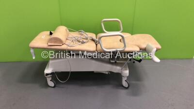 Huntleigh Akron Electric Patient Examination Couch with Controller and Stirrups (Powers Up-Split In Cushion-See Photos)