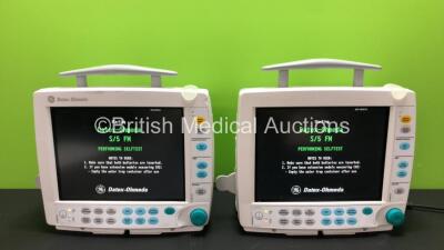 2 x GE Datex Ohmeda S/5 F-FM01 Patient Monitors with 4 x GE SM 201-6 Batteries, 2 x GE Type E-PSMP-00 Modules Including ECG, SpO2, T1, T2, P1, P2 and NIBP Options (Both Power Up) *S/N 6606948 / 6813709 / 6606979 / 5182800*