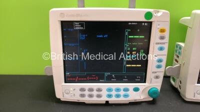 2 x GE Datex Ohmeda S/5 F-FM01 Patient Monitors with 2 x GE Type E-PSMP-00 Modules Including ECG, SpO2, T1, T2, P1, P2 and NIBP Options (Both Power Up with Damage and Missing Light Covers-See Photos) *S/N 6599275 / 6606940 / 6823258 / 6606945*