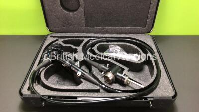 Olympus PCF-230 Colonoscope in Case (Missing Handle) Engineer's Report : Optical System - Slight Stain on R/H Side of Image, Angulation - Not Reaching Specification / To Be Adjusted, Insertion Tube - Kinks and Indents, Light Transmission - Ok, Channels -