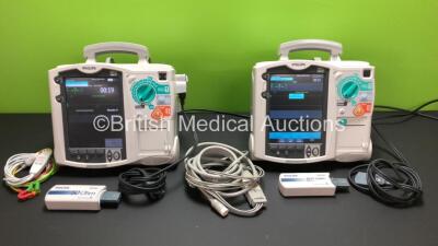 2 x Philips Heartstart MRx Defibrillators Including 1 x Pacer, SpO2, ECG and Printer Options with 2 x Philips M3539A Batteries, 2 x Philips M3538 Module, 2 x ECG Leads and 2 x Paddle Leads with Test Loads (Both Power Up)