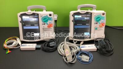 2 x Philips Heartstart MRx Defibrillators Including 2 x Pacer, 2 x ECG, 1 x NiBP and Printer Options with 2 x Philips M3539A Batteries, 2 x Philips M3538 Module, 2 x ECG Leads, 1 x NiBP Lead with Finger Sensor and 2 x Paddle Leads with Test Loads *Mfd 200