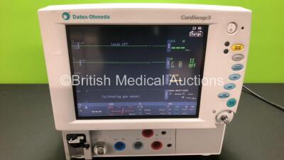 Datex-Ohmeda Cardiocap/5 Patient Monitor with P1, P2, T1, T2, NIBP and SPO2 Options and D-Fend Water Trap *Mfd 2003* (Powers Up with Missing Dial and Noisy)