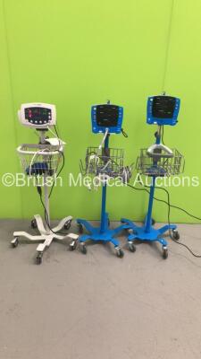 2 x GE Carescape V100 Dinamap Patient Monitors on Stands with 1 x BP Hose and 1 x SpO2 Finger Sensor and 1 x Welch Allyn 53NT0 Patient Monitor on Stand with 1 x SpO2 Finger Sensor and 1 x BP Hose and Cuff (1 x Powers Up,2 x No Power) * SN SDT10400736SA / 