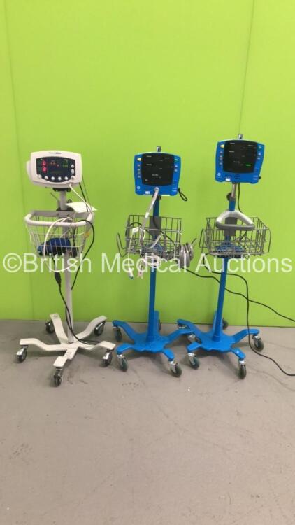 2 x GE Carescape V100 Dinamap Patient Monitors on Stands with 1 x BP Hose and 1 x SpO2 Finger Sensor and 1 x Welch Allyn 53NT0 Patient Monitor on Stand with 1 x SpO2 Finger Sensor and 1 x BP Hose and Cuff (1 x Powers Up,2 x No Power) * SN SDT10400736SA /