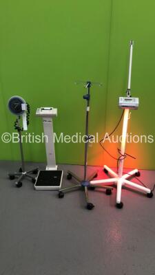 1 x Galderma Aktilite Lamp on Stand (Powers Up), 1 x Seca Stand on Weighing Scales, 1 x Drip Stand and 1 x Blood Pressure Meter on Stand with Hose