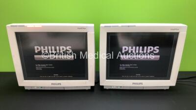 2 x Philips IntelliVue MP70 Touch Screen Patient Monitors Software Version L.01.21 - L.01.21 *Mfd 2007 - 2010* (Both Power Up with Some Damage to Casing - See Photo) *DE843A1337 - DE61751990*