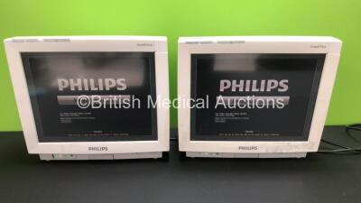 2 x Philips IntelliVue MP70 Touch Screen Patient Monitors Software Version L.01.21 - L.01.21 *Mfd 2007 - 2007* (Both Power Up with Some Damage to Casing - See Photo) *DE73160502 - DE61751953*