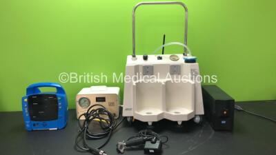 Mixed Lot Including 1 x GE Dinamap ProCare 300 Patient Monitor (No Power) 1 x Eschmann VP35 Suction Unit (Powers Up with Missing Cups) 1 x LMS UPS Unit (No Power) 1 x Oak Medical Regulator Unit and 1 x Welch Allyn Ref 73324 Light (No Power)