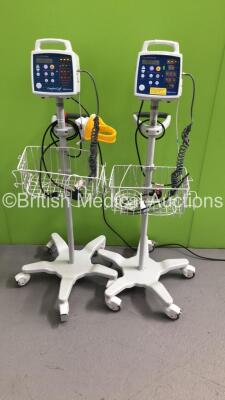 2 x CSI Criticare 506N3 Series Vital Signs Monitors on Stands with BP Hoses and SPO2 Finger Sensors (Both Power Up) *S/N 211556928 / 306605091*