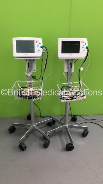 2 x Datex-Ohmeda S/5 Patient Monitors on Stands with NIBP,SpO2 and ECG+Resp Options,2 x BP Hoses,2 x SpO2 Finger Sensors and 2 x 3-Lead ECG Cables (Both Power Up)