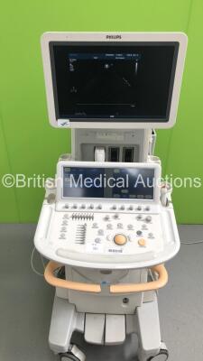 Philips iE33 Flat Screen Ultrasound Scanner on D.0 Cart *S/N 02R6K7* **Mfd 01/2007** Software Version 5.2.2.44 with 1 x Transducer / Probe (S5-1), Sony UP-D897 Digital Graphic Printer and Mitsubishi MD3000 Video Cassette Recorder (Powers Up - Small Marks - 4