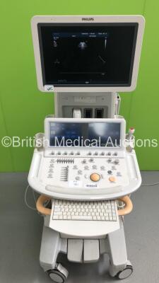 Philips iE33 Flat Screen Ultrasound Scanner on D.0 Cart *S/N 02R6K7* **Mfd 01/2007** Software Version 5.2.2.44 with 1 x Transducer / Probe (S5-1), Sony UP-D897 Digital Graphic Printer and Mitsubishi MD3000 Video Cassette Recorder (Powers Up - Small Marks - 9