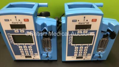 Mixed Lot Including 1 x Datascope IABP Doppler, 1 x Mcube Cube ScanF Bladder Volume Measurement and Uroflowmetry System with Probe and Power Supply in Case (Powers Up) and 2 x Alaris SE Infusion Pumps *BC500-06J-FO21 - 135229296 - 135208008* - 4