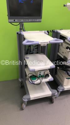 2 x Olympus Stack Trolleys Including Olympus OEV181H Monitor,Olympus Evis Lucera CV-260 Processor,Olympus Evis Lucera MAJ-1154 Pigtail Connector,Olympus Evis Lucera CLV-260 Processor/Light Source Unit,Olympus Keyboard,Olympus Connector Cables and 2 x UPS - 5