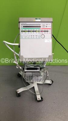 Carefusion LTV 1000 Ventilator on Stand with Hoses and Charging Pack (Powers Up) *S/N A49307* **Mfd 06/2011**