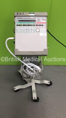 Pulmonetic Systems LTV 1000 Ventilator on Stand with Hoses and Charging Pack (Powers Up) *S/N A25304* **Mfd 12/2008**