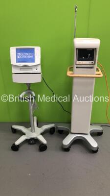 1 x Natus Olympic CFM 6000 Patient Monitor on Stand and 1 x Philips M3046A M3 Patient Monitor on Stand (Both Power Up)