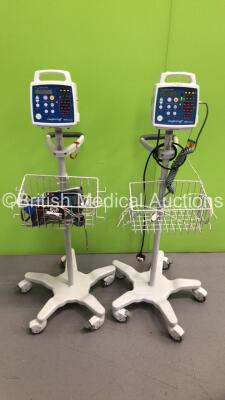 2 x CSI Criticare Comfort Cuff 506N3 Series Vital Signs Monitors on Stand with 1 x SPO2 Finger Sensor and 2 x BP Hoses and Cuffs (Both Power Up) *S/N 306605094 / 211255922*