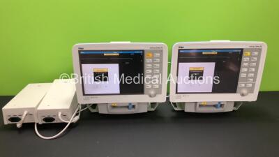 2 x Drager Infinity Delta XL Patient Monitors with HemoMed 1, Aux/Hemo 2, Aux/Hemo 3, NBP and MultiMed Options, 2 x AC Power Supplies and 2 x Docking Stations (Both Power Up) *6004250680 - 5398669345*