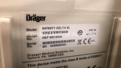 2 x Drager Infinity Delta XL Patient Monitors with HemoMed 1, Aux/Hemo 2, Aux/Hemo 3, NBP and MultiMed Options, 2 x AC Power Supplies and 2 x Docking Stations (Both Power Up) *6004250680 - 5398669345* - 6