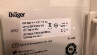 2 x Drager Infinity Delta XL Patient Monitors with HemoMed 1, Aux/Hemo 2, Aux/Hemo 3, NBP and MultiMed Options, 2 x AC Power Supplies and 2 x Docking Stations (Both Power Up with 1 x Damaged Casing - See Photo) *6000538271 - 6004401678* - 7