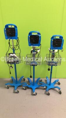 3 x GE Dinamap ProCare Patient Monitors on Stands with 3 x Power Supplies (All Power Up)
