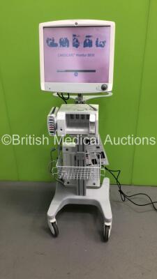 GE B850 Carescape Patient Monitor on Stand with Module Rack Including GE Patient Data Module Ref 2016793-002 with ECG, Temp/Co, P1/3, P2/4, SPO2, NIBP and Defib/Sync Options and 1 x E-MiniC Gas Module (Powers Up)