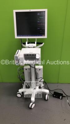 GE CDA19T Patient Monitor on Stand with Module Rack Including GE Patient Data Module Ref 2016793-002 with ECG, Temp/Co, P1/3, P2/4, SPO2, NIBP and Defib/Sync Options and 1 x E-MiniC Gas Module (Powers Up)