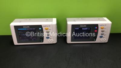 2 x Philips Intellivue X2 Handheld Patient Monitor SW Rev K.21.42 - K.21.42 Including ECG, SpO2, NBP, Temp and Press Options with 2 x Philips M4607A Batteries *Mfd 03-2009, 07-2009* (Both Power Up) *SN DE83629342 - DE83622762*