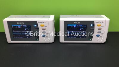 2 x Philips IntelliVue X2 Handheld Patient Monitors S/W Rev K.21.42 / K.21.42 with Press/Temp, NBP, SpO2 and ECG/Resp Options with 2 x Batteries (Both Power Up with 1 x Damaged Casing - Photo) *Mfd 2011 - 2011* *SN-DE03776850 - DE03777154*