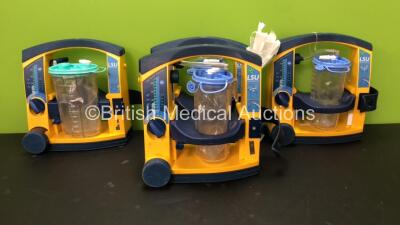 4 x LSU Laerdal Suction Units with 4 x Cups and 4 x Lids (All Power Up) *SN 78021069188 - 78061577039 - 78090957291 - 78090957322*