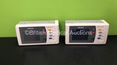 2 x Philips Intellivue X2 Handheld Patient Monitor SW Rev K.21.42 - K.21.42 Including ECG, SpO2, NBP, Temp and Press Options with 2 x Philips M4607A Batteries *Mfd 04-2009, 07-2009* (Both Power Up) *SN DE83629341 - DE83624500*