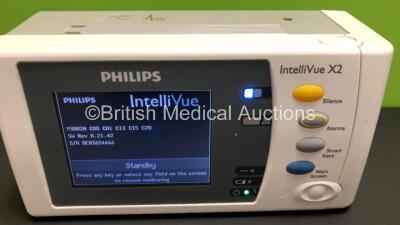 Philips IntelliVue X2 Handheld Patient Monitor S/W Rev K.21.42 with Press/Temp, NBP, SpO2 and ECG/Resp Options with Battery (Powers Up) *Mfd 2009* *SN-DE83624466* - 2