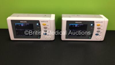 2 x Philips IntelliVue X2 Handheld Patient Monitors S/W Rev K.21.42 / K.21.42 with Press/Temp, NBP, SpO2 and ECG/Resp Options with 2 x Batteries (Both Power Up) *Mfd 2009 - 2009* *SN-DE83629197 - DE83629489*