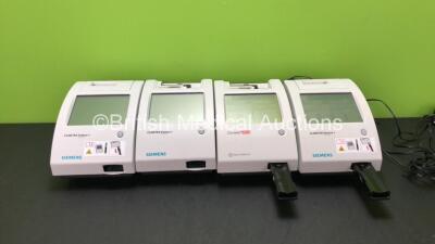 Job Lot of Analyzer Units Including 3 x Siemens Clinitek Status + Analyzer Units and 1 x Bayer HealthCare Clinitek Status Analyzer Unit with 3 x AC Power Supplies (All Power Up, 2 with Missing Printer Covers-See Photos) *SN 272386 - 239622 - 35355 - 22929